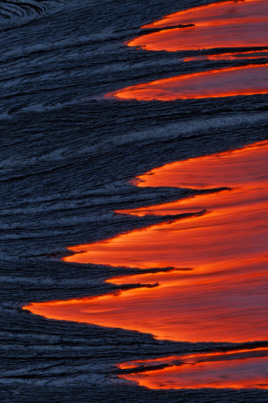 In this artistic lava image, a lava river breaks the charred surface in a unique pattern. Shop this print & a variety of photos of Hawaii lava flow for sale.