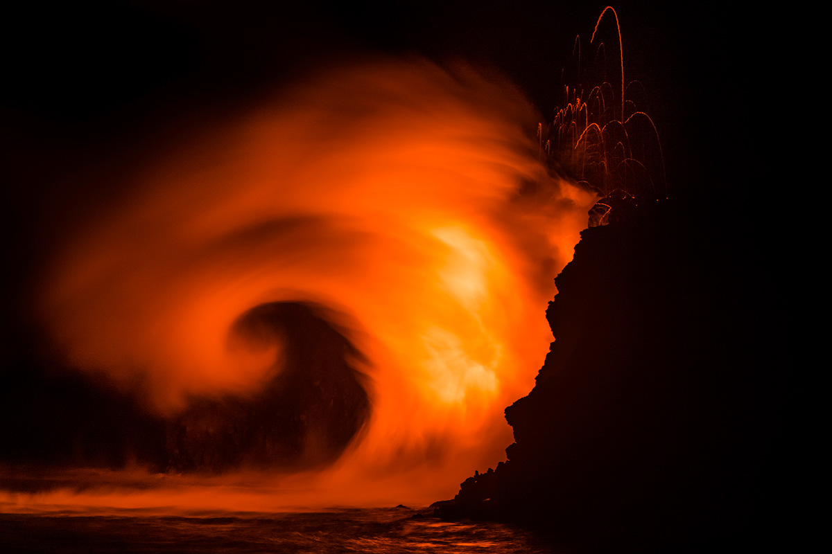 Shooting the lava at night it was exploding 100-150 feet in the air for hours.  As it exploded  in this image the wind direction...