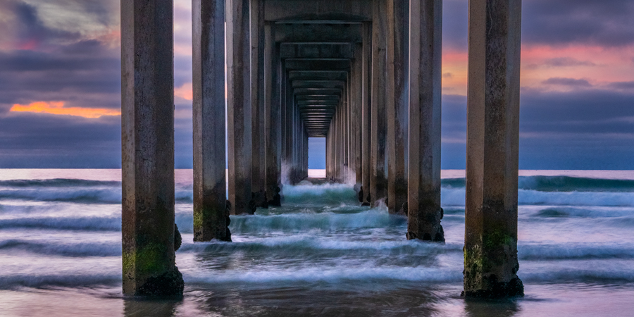 Crashing waves make its wave through The Scripps Pier just after sunset creating the drama I was hoping for .The Ellen Browning...