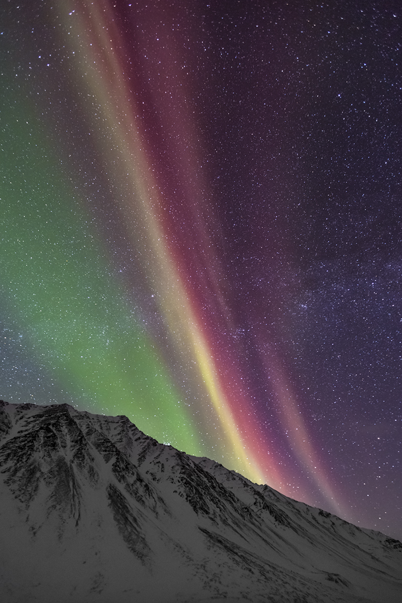 A rare display of the color red in the northern lights shows its beauty over the Brooks Mountain Range.  Solar activity is a...